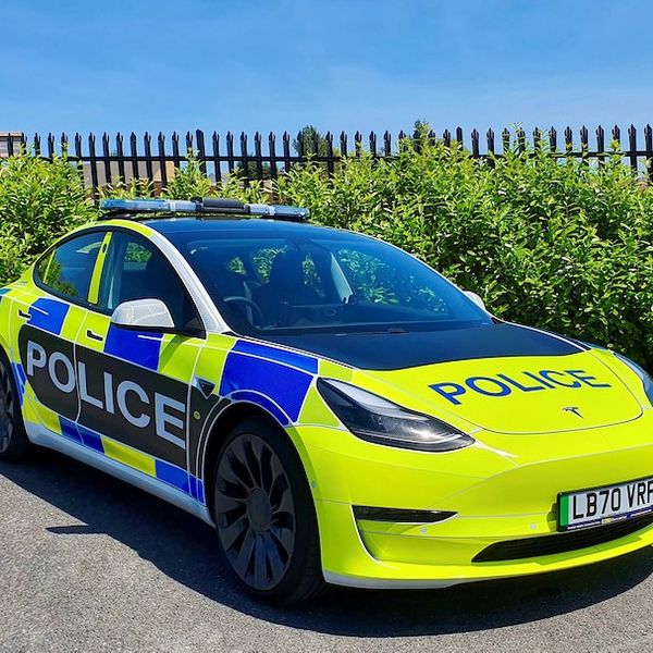 Tesla Model 3 police car in UK, front static shot. 